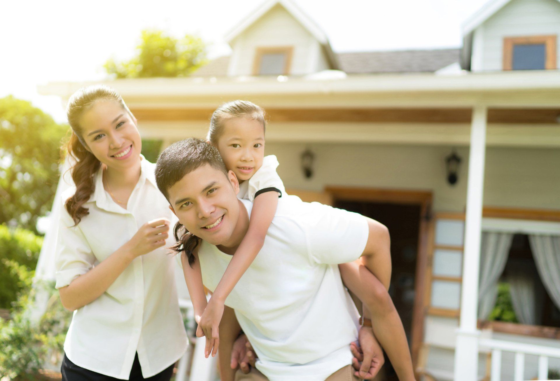 Family in front of home — Grapevine, TX — Silvas Law, PC